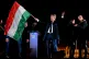 Peter Magyar, leader of the opposition Tisza party, waves the Hungarian flag following the announcement of the partial results of the parliamentary election in Budapest, Hungary, April 12, 2026