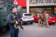 Police officers at the site of a mass shooting in Kyiv, Ukraine, April 18, 2026