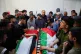 Mourners gather around the bodies of Aws al-Na'san and Jihad Abu Naim, residents of the West Bank village of al-Mughayyir, at the hospital's morgue in the West Bank city of Ramallah, April 21, 2026