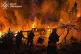 In this photo provided by the Ukrainian Emergency Services, rescue workers put out a fire of a residential building destroyed by a Russian drone strike on Odesa region, Ukraine, April 29, 2026