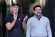 LIV Golf CEO Greg Norman, left, applauds Yasir Al-Rumayyan, Governor of Public Investment Fund of Saudi Arabia, at the LIV Golf Invitational-Chicago tournament September 18, 2022, in Sugar Hill, Ill. 