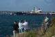 Journalists do a standup in front of the Russian-flagged oil tanker Anatoly Kolodkin docked in Matanzas, Cuba, March 31, 2026