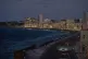 Vehicles traverse the Malecon at dusk in Havana, April 15, 2026