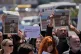 Journalists holds up newspapers showing portraits of Lebanese journalist Amal Khalil who was killed on Wednesday in an Israeli airstrike, during a sit-in against the killing of her and other journalists in Beirut, Lebanon, April 23, 2026