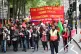 People take part in a May Day march on Aldwych in London