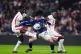 England's Kobbie Mainoo and Marc Guehi battle with Japan's Ayase Ueda (centre) during the international friendly match at Wembley Stadium, London, March 31, 2026