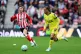 Sunderland's Trai Hume (left) and Tottenham Hotspur's Xavi Simons battle for the ball during the Premier League match at the Stadium of Light, Sunderland, April 12, 2026