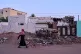 A woman walks along a street in Omdurman, Sudan, on the outskirts of Khartoum, April 17, 2026