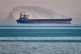 A bulk cargo ship sits at anchor in the Strait of Hormuz off Bandar Abbas, Iran, May 2, 2026