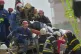 Rescuers carry a body of a local resident killed when a Russian missile hit an apartment building during massive air attack in Kyiv, Ukraine, May 14, 2026
