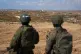 Israeli soldiers occupy a military position overlooking the so-called Yellow Line in the central Gaza Strip