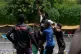 A migrant from Mali celebrates with teammates after scoring a goal during a semifinal soccer match against Congo for the Kypseli Mundial in Athens, Greece, May 24, 2026
