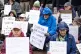 Campaigners take part in a Defend Our Juries protest outside Queen Elizabeth House, Edinburgh, November 18, 2025