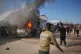 Palestinians gather around a vehicle struck by an Israeli airstrike in Khan Younis, southern Gaza Strip, May 6, 2026
