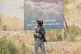 Forces of the regional Kurdish administration secure the area of the Jasana Cave ahead of a symbolic disarmament ceremony by the separatist PKK group as part of the peace process with Turkey, in Sulaymaniyah governorate, Iraq, July 11, 2025