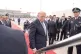 MUCH TO PONDER: President Donald Trump boards Air Force One on May 15 2026, at Beijing Capital International Airport - first from the left is China's Foreign Minister Wang Yi
