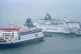 An Irish Ferries ferry passes the Pride of Canterbury (left) at the Port of Dover in Kent