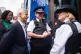 Mayor of London Sir Sadiq Khan and Metropolitan Police Commissioner Sir Mark Rowley speak to police officers during a walkabout in the West End of London, July 30, 2025