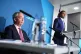 Reform UK party leader Nigel Farage (left) listens as Reform's home affairs spokesperson Zia Yusuf speaks during a press conference at Millbank Tower in Westminster, central London, April 13, 2026