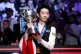 Wu Yize celebrates with the trophy after winning the Halo World Snooker Championship 2026 Final against Shaun Murphy at the Crucible Theatre, Sheffield, May 4, 2026