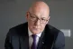 JOHN SWINNEY