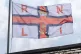 The Royal National Lifeboat Institution (RNLI) flag flying at the Fraserburgh lifeboat station in Aberdeenshire