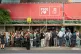 Journalists gather outside the headquarters of Spain's ruling Socialist Party as police search the building in Madrid, May 27, 2026