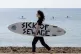 People take part in a protest by Surfers Against Sewage (SAS), in Falmouth, who are calling for an end to the sewage discharges plaguing the UK's rivers and seas, May 18, 2024