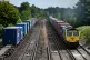 Two Freightliner Freight trains pass on the tracks as they make their way through Worting Junction near to Basingstoke, Hampshire