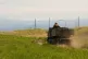 U.S. Marines drive off on a military truck with the High Mobility Artillery Rocket System (HIMARS) mounted on after they conducted its live-fire training during a media tour at Camp Fuji, in Gotemba, southwest of Tokyo, May 20, 2026