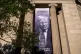 A giant portrait of President Donald Trump looks down from the Justice Department in Washington, June 2, 2026