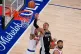 San Antonio Spurs forward Victor Wembanyama (1) shoots as New York Knicks guard Josh Hart (3) and center Karl-Anthony Towns (32) defend during the second half of Game 3 of the NBA Finals basketball series, June 8, 2026, in New York