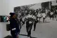 A man looks at June 16 iconic image taken by the late Sam Nzima displayed at The Hector Pieterson Memorial and Museum, in Soweto, South Africa, June 15, 2026