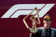 Mercedes driver George Russell of Britain celebrates on the podium after winning the Austrian F1 Grand Prix, in Spielberg, Austria, June 28, 2026
