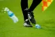Water bottles are thrown onto the pitch during the FIFA World Cup Group G match at Stadium 974 in Doha, Qatar, December 2, 2022
