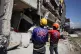 Rescuers inspect a damaged building following an earthquake in General Santos, Philippines, June 9, 2026