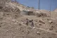 Palestinian students walk on their way home after receiving their year end reports from school, in the West Bank Bedouin hamlets of Khan al-Ahmar, June 10, 2026