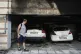 A man looks at burned vehicles following firebomb attacks that apparently targeted members of Greece's governing conservative New Democracy party in the northern port city of Thessaloniki, Greece, July 1, 2026