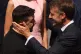 French President Emmanuel Macron (right) speaks with Ukraine's President Volodymyr Zelensky after the Bastille Day military parade on the Champs-Elysees avenue, in Paris, July 14, 2026