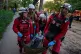 Red Cross volunteers carry an injured woman into an ambulance after a Russian strike in the Lukianivka neighbourhood of Kyiv, Ukraine, May 24, 2026