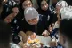 Palestinian women mourn over the body of Awda Farakhneh, 53, — who was killed by Israeli army soldiers following a settler attack — during his funeral in the West Bank town of Deir Jarir, northeast Ramallah, July 20, 2026