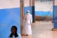 A health worker, wearing protective gear, stands outside the Ebola Treatment Center at the Bunia General Hospital in Ituri, Congo, July 22, 2026