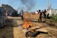 Rubble set on fire as health and frontline workers protest at the Elikya Ebola Treatment Center in Bunia, Congo, July 25, 2026