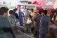 People transport a man, who was inured in the militant attack on a police post in Hangu district, upon arrival at a hospital in Peshawar, Pakistan, July 30, 2026