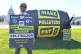 Across the pond: Activists make similar demands yesterday in Washington DC