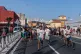 Migrants run from Spanish police officers after crossing from Morocco into the Spanish enclave of Ceuta