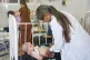 A LITANY OF PAIN: A four-year-old cancer patient, Nashly Zerquera, is examined by Dr Yolainy Romero Rodriguez at the National Institute of Oncology and Radiobiology in Havana, Cuba, last Wednesday