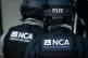 Officers from the National Crime Agency arrive at a property in Grays, Essex, June 19, 2023