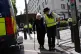 A police officer detains Reverend Sue Parfitt who declared her support for Palestine Action outside the headquarters of the Metropolitan Police at New Scotland Yard, central London, July 5, 2026