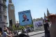 A man holds an anti-Nigel Farage placard outside the Houses of Parliament in Westminster, central London. Reform UK leader Nigel Farage has announced he will quit as the MP for Clacton and trigger a by-election, amid mounting pressure over unregistered donations of cash and support, July 8, 2026